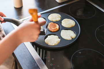 Cooking Pancakes on Modern Stove