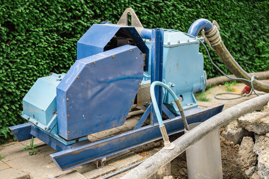 Modern street sater pump on a hot summer day