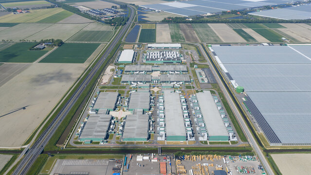 aerial drone video of large scale hyperscaler, datacenter, big data, ai and internet infrastrucutre. Cloud services. Aerial view.