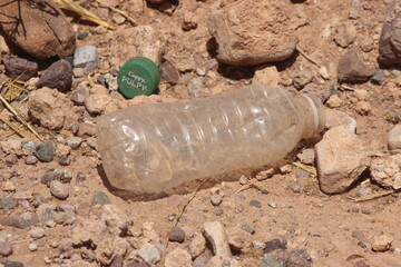 A plastic bottle lying on the ground