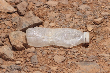 A plastic bottle lying on the ground