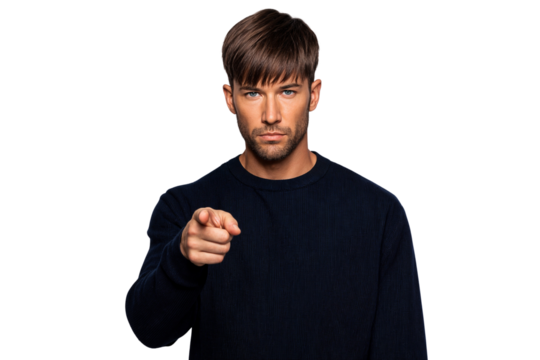 Portrait of a handsome young man pointing at you with serious expression and looking at camera
