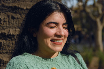 portrait of a young woman in love in the park