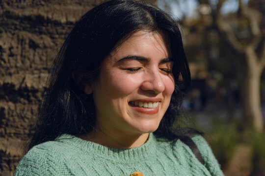 portrait of a young woman in love in the park