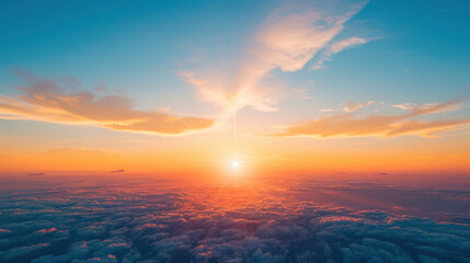 The sky is a beautiful orange color with a sun shining brightly