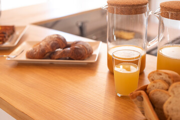 display of croissant and juice to be serve