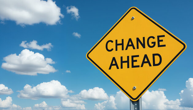 Road Warning Sign - Yellow Diamond with Change Ahead Text Against Blue Sky for Business Transformation, Career Pivots, and Motivational Content