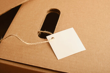 cardboard storage box and label mockup, close up, kraft box