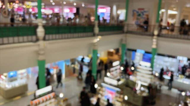 Interior of the department store Le Bon Marche, 7th arrondissement of Paris, France. Founded in 1838 it was one of the first modern department stores. Out of focus.