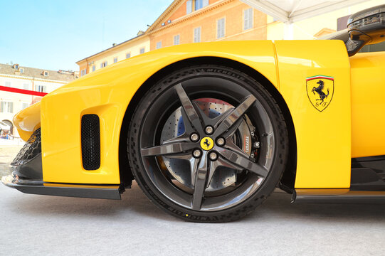Modena, Italy, june 6 2025, Ferrari new model F80 (2025) in a square for a car show, car body detail with wheel