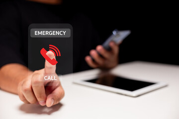 A person uses a futuristic touchscreen interface to initiate an emergency call, with a smartphone...