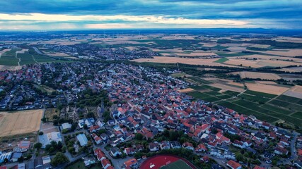 Aerial view around the old town of the city Ober-Olm on a sunny spring morning