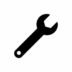 Simple black silhouette of an open ended wrench on a white background