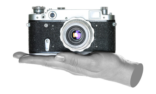 Women hand holds a retro photo camera, isolated on transparent background, front view, retro things concept. Contemporary art - Powered by Adobe