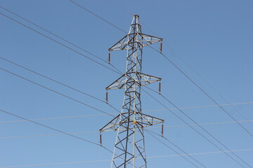 A view of an electric pole with line wire