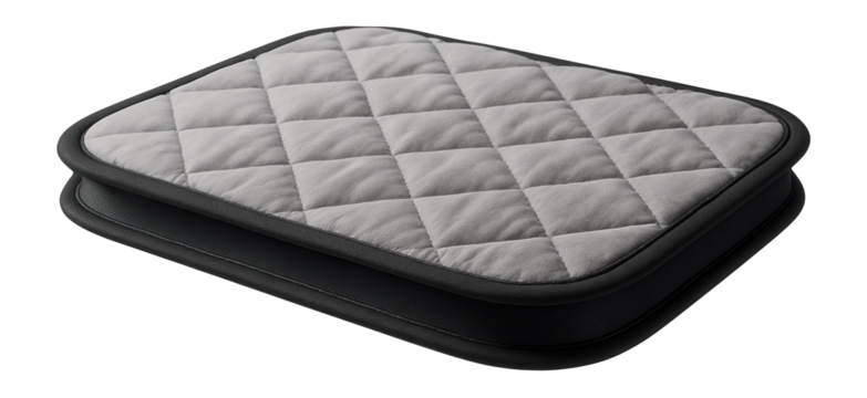 A waterproof pet pad with a quilted top layer for cats in a private house.
