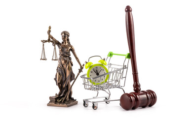 Judge's gavel, Themis figure and alarm clock in miniature shopping cart on white background