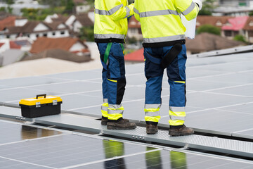 Solar panel, Solar system. Team of engineers or technicians maintaining and repairing solar power...