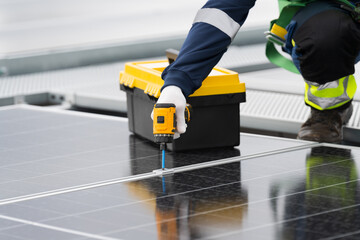 Solar panel rooftop, Rooftop solar power. Engineer or technicians maintaining and repairing solar power systems on rooftop of building. Hands of engineer install solar cell on rooftop