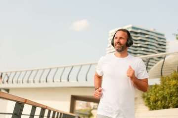 Morning jogger enjoys the sunrise in a bustling urban landscape