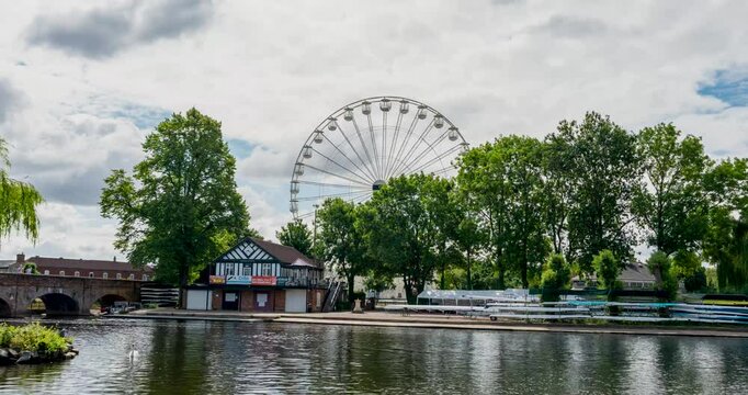 Ferris wheel standing tall over the river avon in Stratford upon Avon