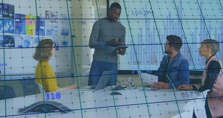 Project lead activating tablet showing business data with grid overlay while team reviewing charts - Powered by Adobe