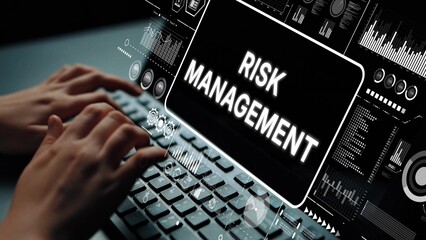 Concept of Risk Management with Hands Typing on Keyboard Surrounded by Data Visualization Elements....