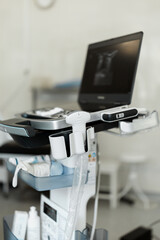Portable ultrasound machine in sterile operating room. Used for real-time imaging, diagnostics, and...