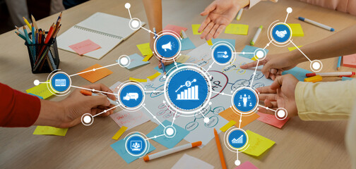 Professional startup group share creative marketing idea by using mind map. Young skilled business...