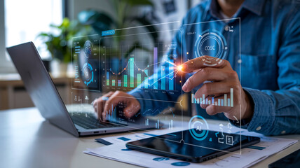 A sleek digital business analytics dashboard overlays a contemporary workspace, showcasing interactive charts, graphs, and metrics