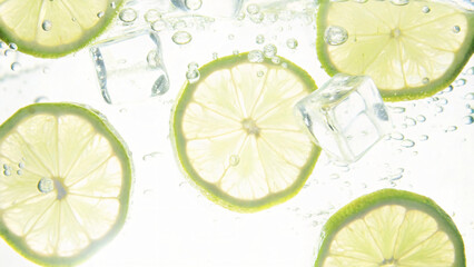 Refreshing Citrus Splash Lime Slices and Ice Cubes in Sparkling Water for a Cool and Invigorating Drink