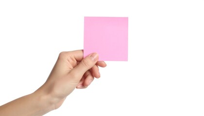 Fototapeta premium Hand holding a pink sticky note (1)
