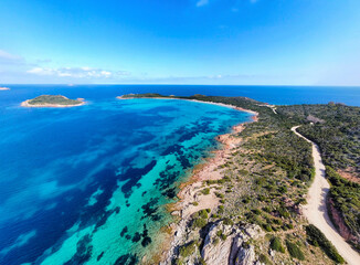 Aerial view of Capo Coda Cavallo shoreline in springtime