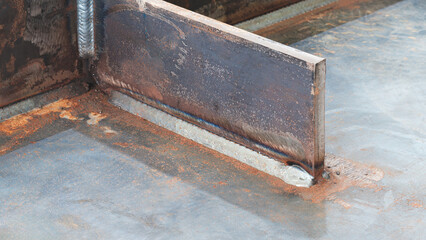 welding seam onto steel metal Industrial steel welder in factory.