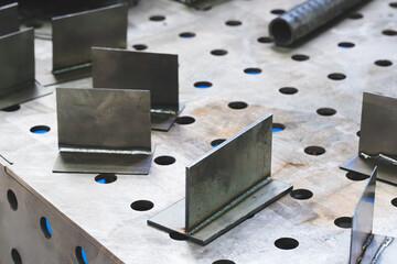 welding seam onto steel metal Industrial steel welder in factory.