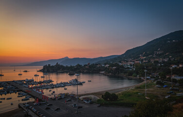 Panoramic sunrise view of sea port of Cefalu, Metropolitan City of Palermo, coastal town in northern Sicily, Italy. August 2024.