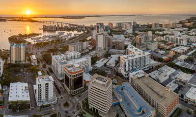 Above view of Sarasota city, Florida with waterfront office high-rise buildings and John Ringling...