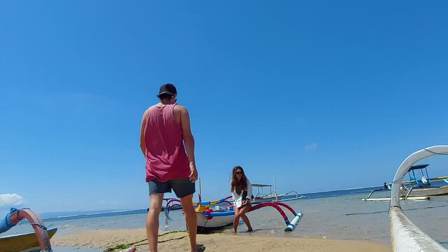 Beach Lifestyle and Traditional Boats in Sanur, Bali