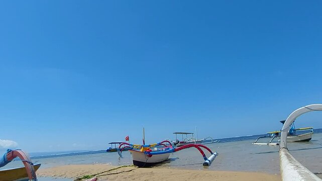 Beach Lifestyle and Traditional Boats in Sanur, Bali