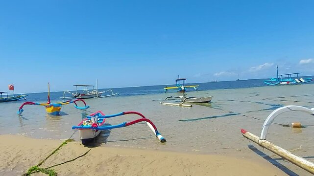 Beach Lifestyle and Traditional Boats in Sanur, Bali