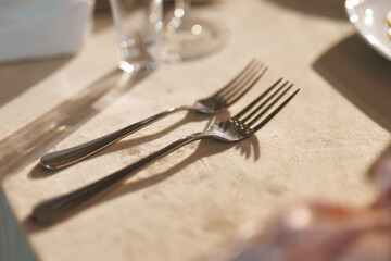 silver forks on a festive table at a banquet