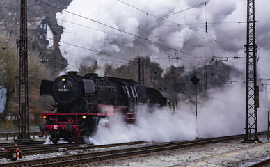 steam locomotive on railway in winter
