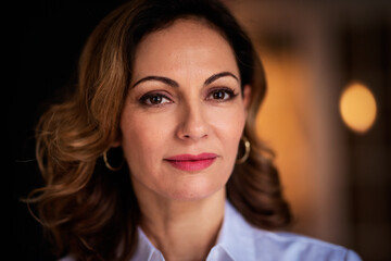 Portrait of an attractive middle aged woman smiling at camera