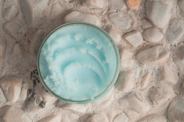 Blue cream in a round jar top view