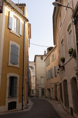 Winding Alley with Colorful Shuttered Homes in Narbonne, France