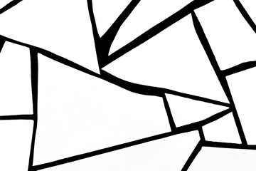 Abstract black and white geometric line art featuring sharp triangular patterns