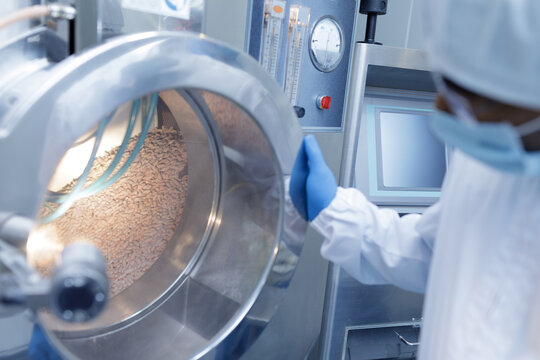 Pharmaceutical Tablet Production Line in Cleanroom Laboratory with Modern Packaging Equipment