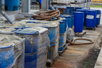 Outdoor Storage of Industrial Blue Drums