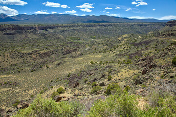 Scenic volcanic rock formations are plentiful along the picturesque route through the Rio Grande...