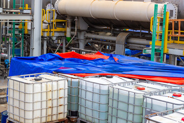 Industrial Facility with IBC Containers and Piping